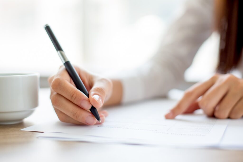 Premed Personal Statement An image illustrating the importance of crafting a compelling premed personal statement, featuring a focused individual diligently working on their application.