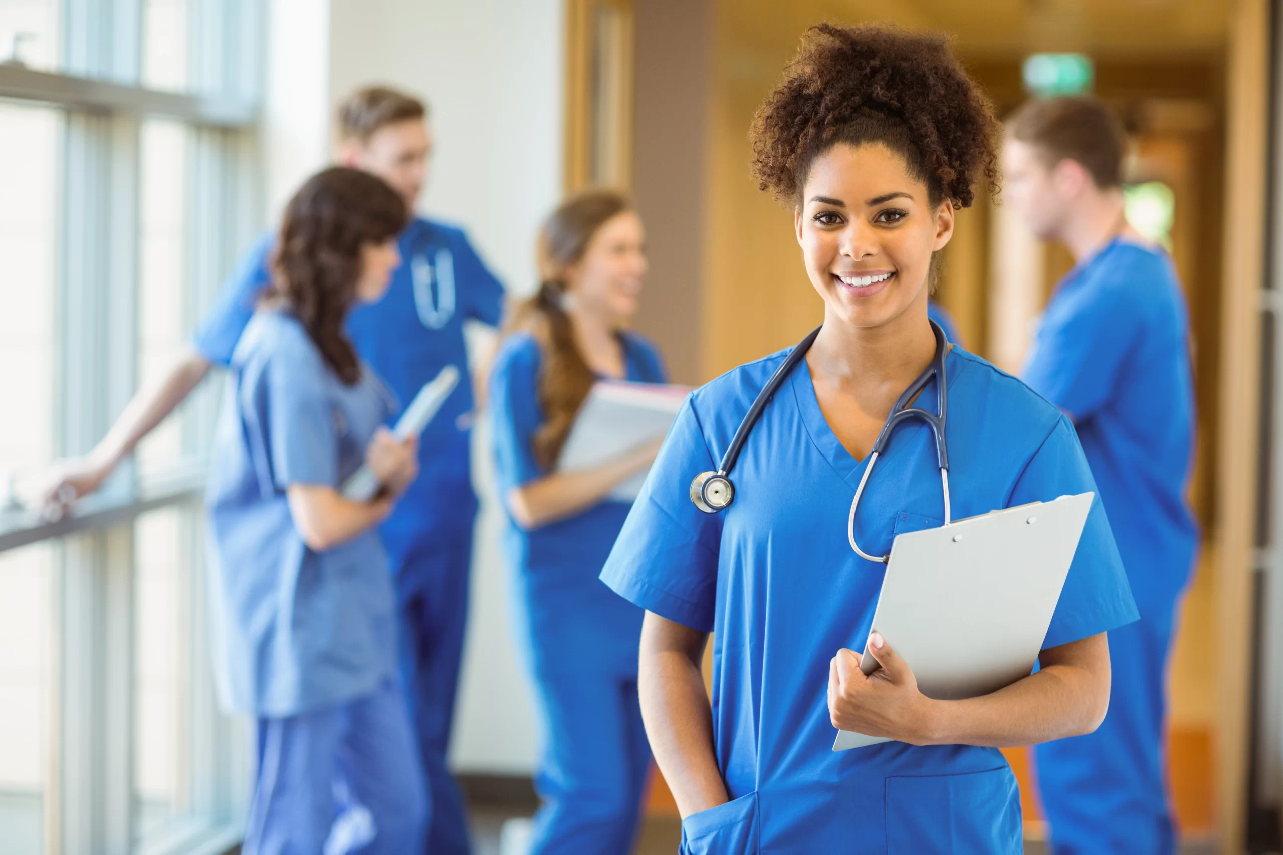 An image featuring a smiling medical student looking at the camera. This image highlights the joy and satisfaction of pursuing a medical career, showcasing the positive experiences facilitated by The Match Guy services.